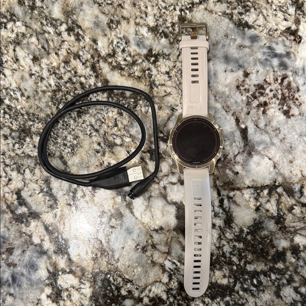 Garmin Fenix 7S Pro Smartwatch with Cream Strap